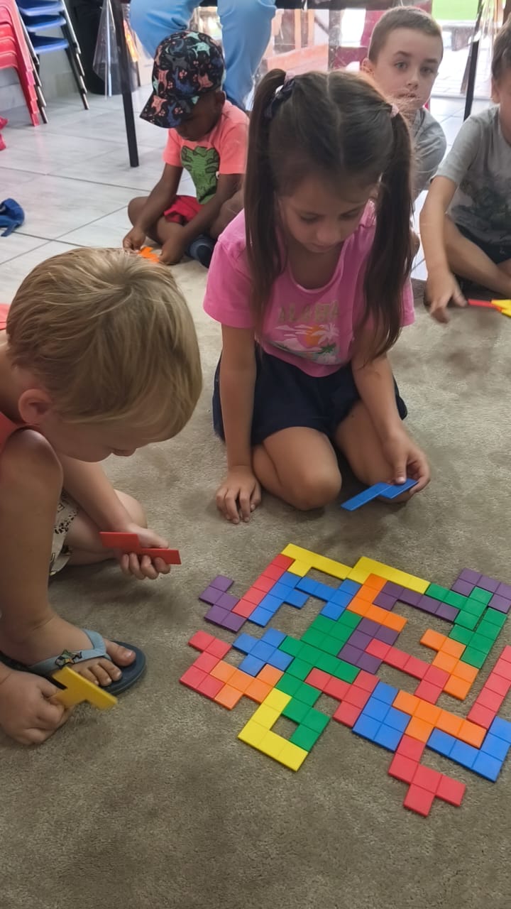 Children working together on activities at Luluki Preschool